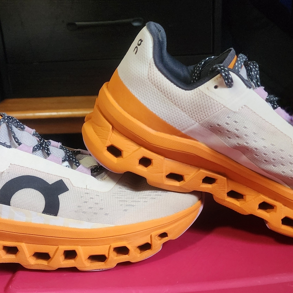 On Running Shoes with Orange Soles